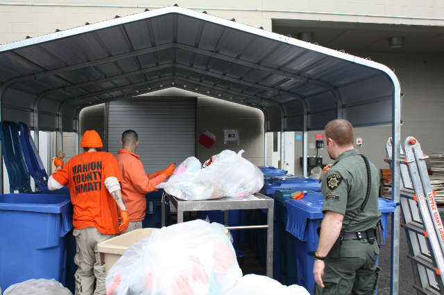 prisoners sorting recyclables