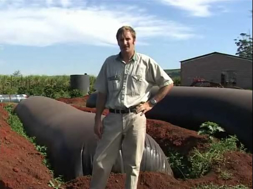 shelby tyne in front of his methane digesters