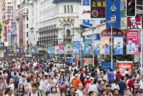 a crowded street in shanghai