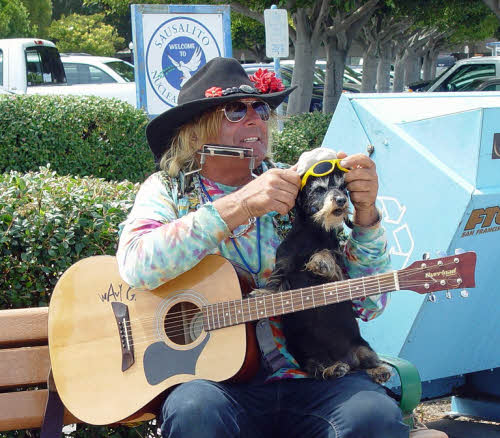 folk singer with dog