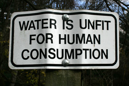 sign that reads water is unfit for human consumption