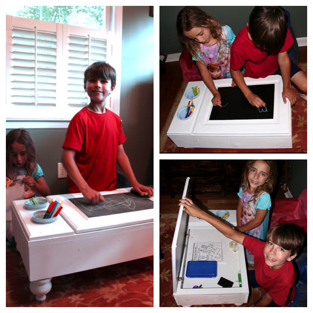 children playing with art table